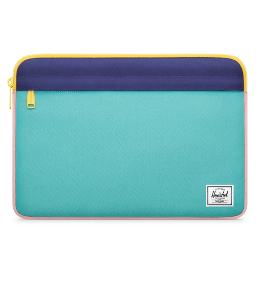 The Herschel Supply Anchor Sleeve for MacBook, blue and teal colour, top zip, zip front pocket, company logo in the lower right