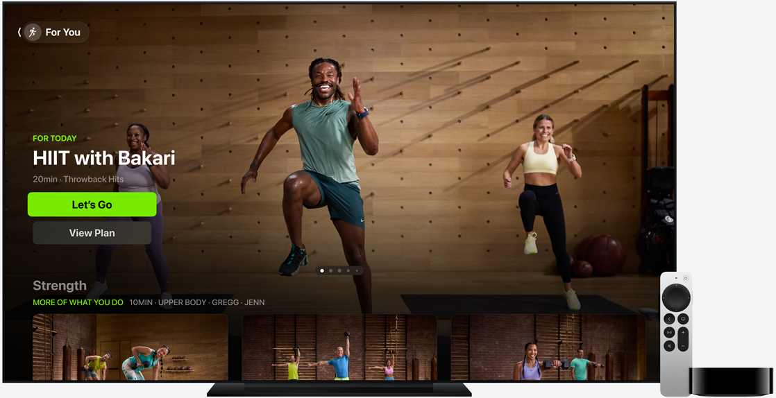 TV showing start screen for HIIT with Bakari next to Apple TV Remote and Apple TV 4K
